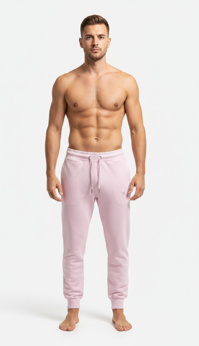Male model wearing premium Pink athletic joggers on white background front view